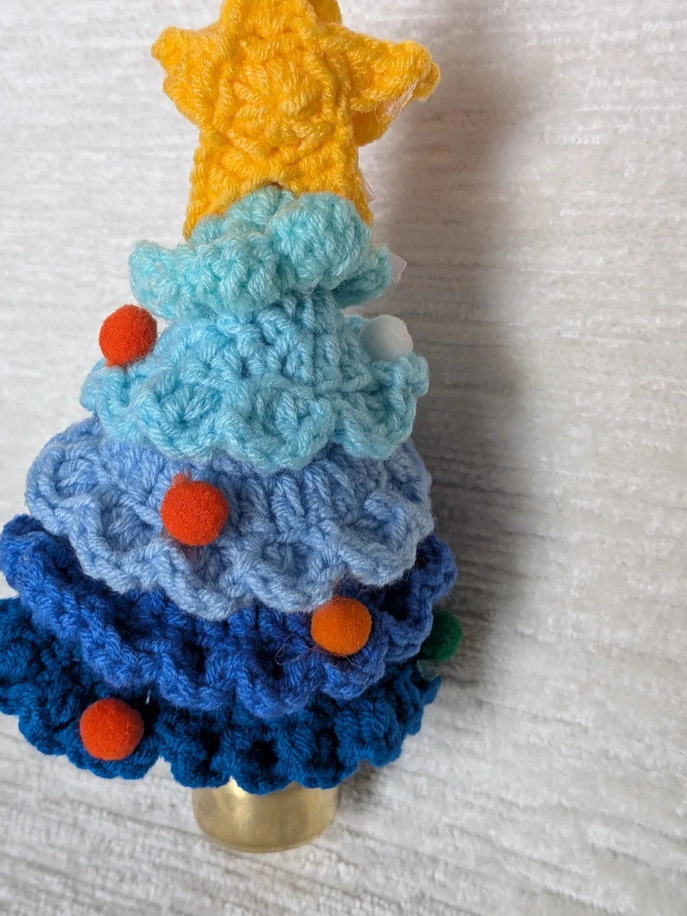 Crocheted Blue Layered Tree Ornament with Yellow Star And Bell
